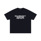 Real men don't wear pink they eat it Statement Oversized Tee